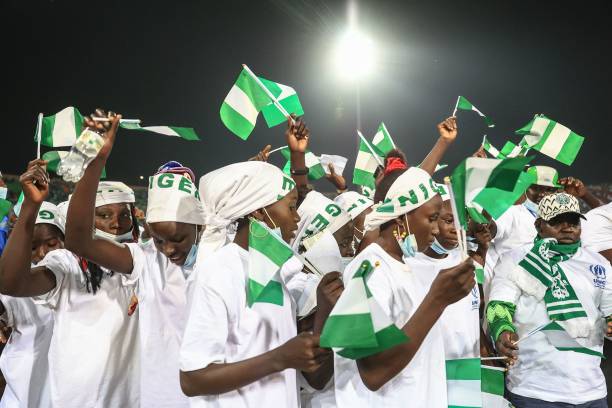 Players from the women's football team in the Minawao refugee camp attend an Africa Cup of Nations (CAN) match between Nigeria and Sudan in Garoua on January 15, 2022. - The girls, ranging in age from 15 to 20, fled with their families to Cameroon years ago, as Boko Haram jihadists wreaked havoc in their country.
At a refugee camp in Minawao, in Cameroon's Far North region, the girls took up football, forming a team with whatever equipment came to hand.
At the weekend, thanks to an initiative of the UN refugee agency UNHCR, the girls got the treat of their lives: they were taken to a match between Nigeria and Sudan. (Photo by Daniel Beloumou Olomo / AFP) (Photo by DANIEL BELOUMOU OLOMO/AFP via Getty Images)